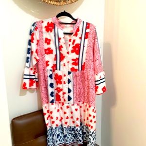 Dress never worn boutique style knee length. Fits true to size